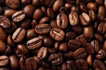 Obraz premium Roasted Coffee beans background, texture and copy spase, top view.