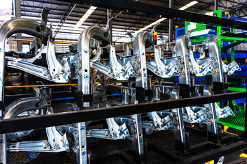 Close up line of auto parts production in automoblie manufacturing factory  - obrazy, fototapety, plakaty