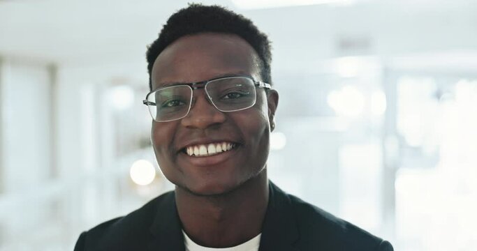 Black man, portrait and smile in office, happy and interview for job offer, corporate and workplace. Career growth, promotion and incentive for pitch in selection process, project and human resources