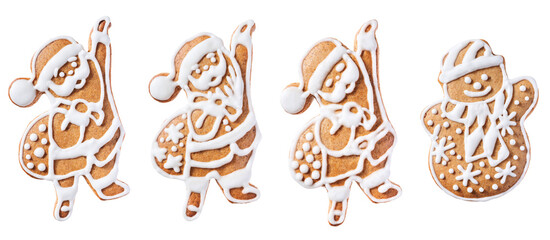 A set of gingerbread men in the form of Santa Claus. Isolated on white background.