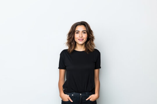 Mock Up Beautiful Woman In Black Tshirt And Jeans On White Background . Сoncept Create Professional Mockups, Women Clothes As An Expression Of Style, Black Colour And Its Meaning