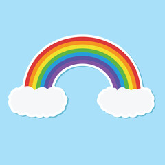 rainbow over two clouds in light blue background