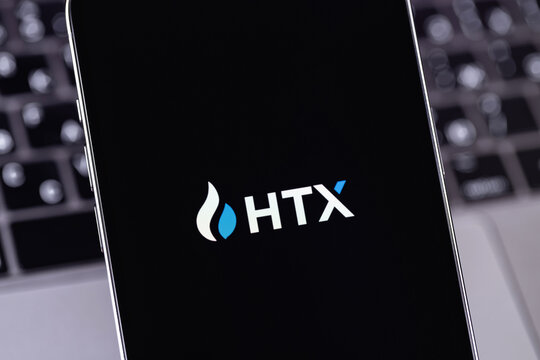 HTX, Huobi mobile logo app on a screen smartphone iPhone closeup. HTX (Huobi) - one of the largest cryptocurrency exchange on the market. Batumi, Georgia - September 16, 2023