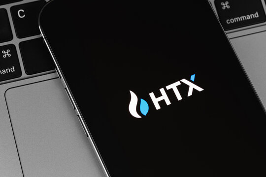 HTX, Huobi mobile logo app on a screen smartphone closeup. HTX (Huobi) - one of the largest cryptocurrency exchange on the market. Batumi, Georgia - September 16, 2023