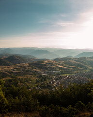 Fototapeta na wymiar Amazing and epic sunrise in the Bulgarian village of Breznitsa.