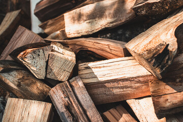 Preparation of firewood for the winter. Firewood background.