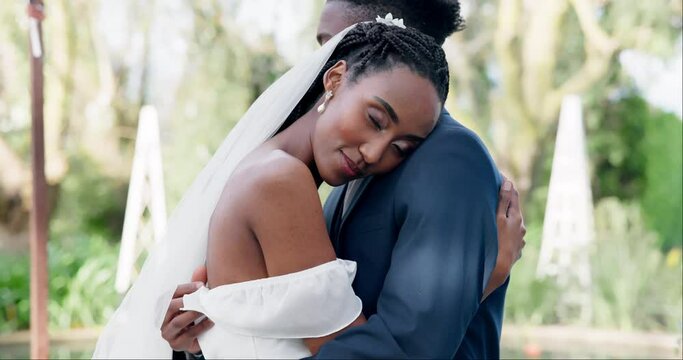 Happy, couple and dance at outdoor wedding with bride and groom with slow, movement and peace together. Calm, happiness and black woman dancing with head on man shoulder and love, support or marriage