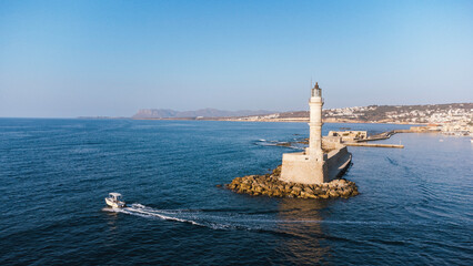 Old lighthouse building at Chania, Greece. Famous travel tourism landmark. Aerial top down drone view. - 650829697