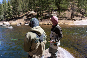 Husband and wife fly fishing in Cheesman Canyon Colorado