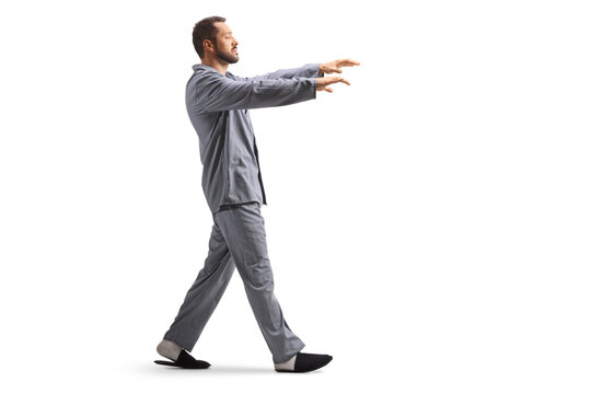 Full length profile shot of a man sleepwalking
