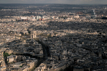Paris, France - April 3 2019: The arc de triomphe from the eiffel tower over the streets of Paris on a clear day