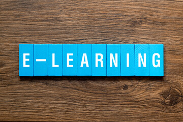 E - learning - word concept on building blocks, text