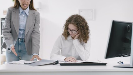 Angry, burnout and pressure with female boss shouting to discipline staff member, overworked worker in glasses feel chaos with paperwork