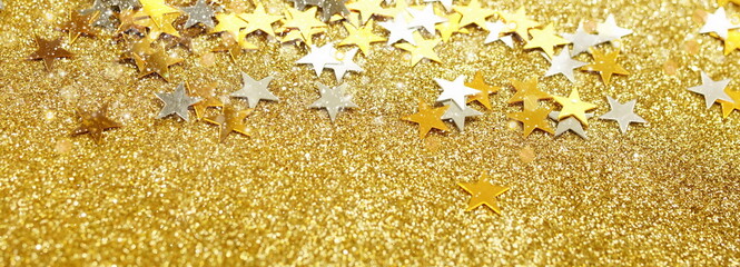 Abstract gold stars sparkle background template banner . Copy space.Christmas blur glitter bokeh...