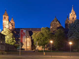 Worms Cathedral in twilight, Germany. The cathedral was built from about 1130 to 1181. This is one of the three Rhenish imperial cathedrals besides the Mainz Cathedral and Speyer Cathedral.