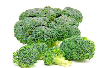 Broccoli on a white background. Slice of green fresh broccoli