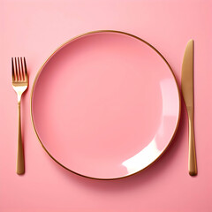 Pink ceramic plate with fork and knife lying next to on pink background. High resolution