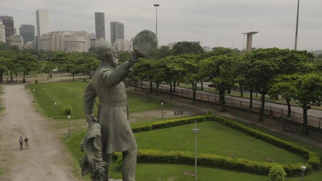 Aerial shot of Admiral Barroso Monument bronze statue at Paris Square with urban scenery in background in Rio de Janeiro, Brazil