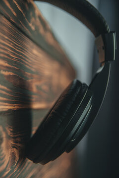 Music headphones. Dark photography, selective focus