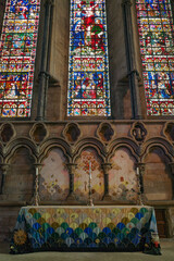 Durham, UK - 12 July, 2023: Colourful stained-glass windows in Durham Cathedral, England