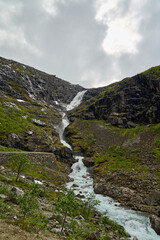 waterfall along the narrow mountain road at the Trollstigen