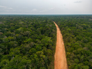 Drone shot of the famous BR-319 in dry season, a dirt road through the Amazon rainforest between Manaus and Porto Velho in Brazil, South America