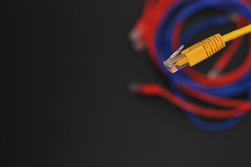 Bouquet of network internet red cable on black background