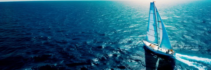 Rolgordijnen Regatta of sailing ships with white sails on the high seas. Aerial view of a sailboat in a windy state. © Александр Марченко