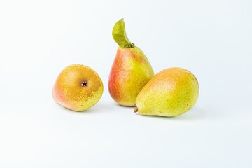 Ripe pears against a white background