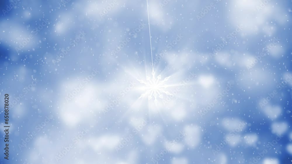Poster shining snowflake swing on the string with bright blue snowy background.