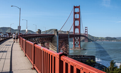 Beautiful view of the Golden Gate Bridge with people walking on it