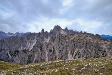 Fototapeta na wymiar Mesmerizing landscape under a gloomy sky in the Dolomites Alps, Italy