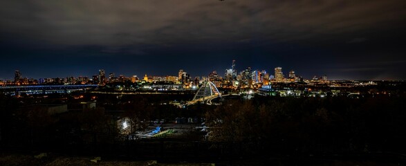 Panoramic aerial night view of the illuminated city skyline of Edmonton, Alberta, Canada