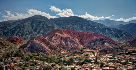 Scenic view of Purmamarca town in Argentina with the Hills of Seven Colors in the background