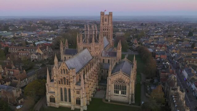 Aerial panning view Ely Cathedral in Cambridgeshire. England. Scenic England countryside houses, culture, religion concept