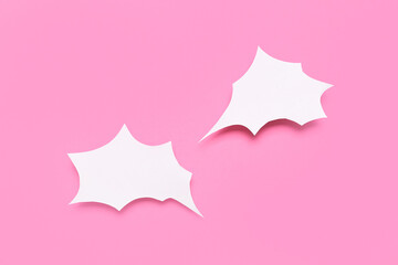 Blank speech bubbles on pink background