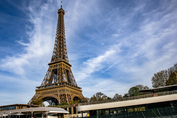 Low angle shot of the world-known Eiffel Tower in Paris, France - obrazy, fototapety, plakaty