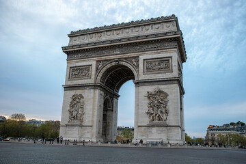 Fototapeta na wymiar Famous Arc de Triomphe monument in Paris, France