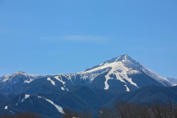 Fototapeta premium Scenic view of snow-capped Todorka Peak. Bansko, Bulgaria.
