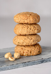 Macro food photography of oat biscuit; oatmeal; cookie;nut; hazelnut, pastry, dessert