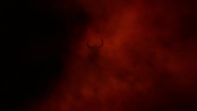 Horned evil demon stands inside gloom. Spooky angel 2D animation. Horror fantasy genre. Mysterious light inside murk. Animated nightmares video clip. Creepy dark character. Orange and black background