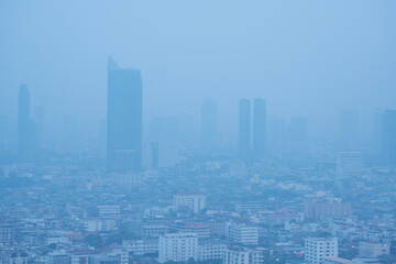 Skyscraper mist bad problem unhealthy toxic pm2.5 weather smog bangkok city in morning. Fog skyline...