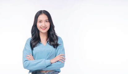Confident success asian woman standing arms crossed on white background. Positive charming young woman wear casual smiling arms crossed over isolated. Successful occupation lifestyle concept. - obrazy, fototapety, plakaty