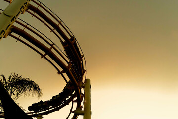 Sunset View Of An Amusement Park On The California Coast