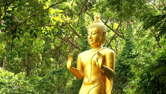 Buddha statue in Huy Tung Tho reservoir , Chiangmai province Thailand.
