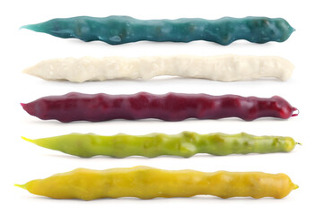 Collage with tasty colorful churchkhelas on white background