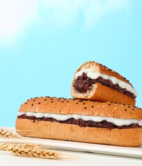 Purple rice filled brioche bread, wheat breakfast, sesame and cream baguette