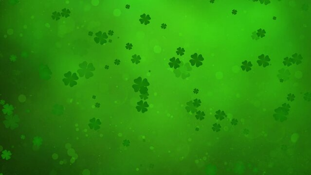Saint Patrick's Day - Dancing Clovers on green background - Floating Shamrocks in motion