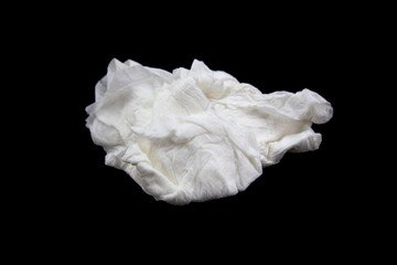 Used wet toilet paper on a black background.