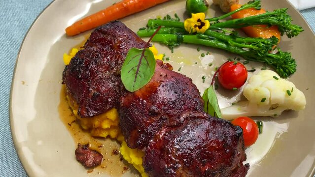 Delicious tender beef cheecks with creamy polenta and vegetables, fancy restaurant dining experience, soft meat, 4K shot